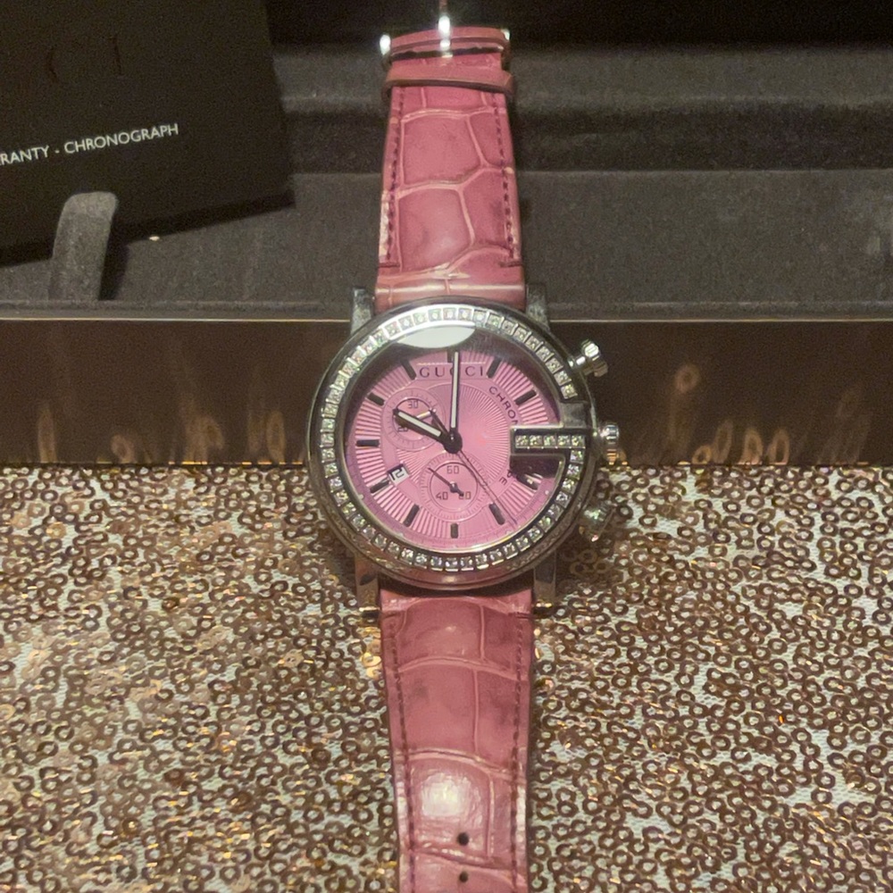 AUTHENTIC GUCCI rare watch w/ genuine pink alligator strap & diamond face.